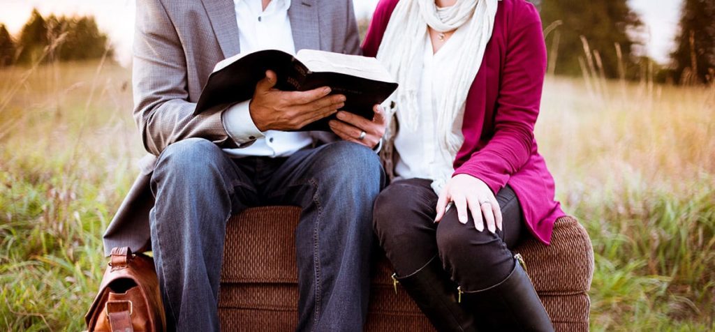 Man and woman with bible e1574364908166 (1)